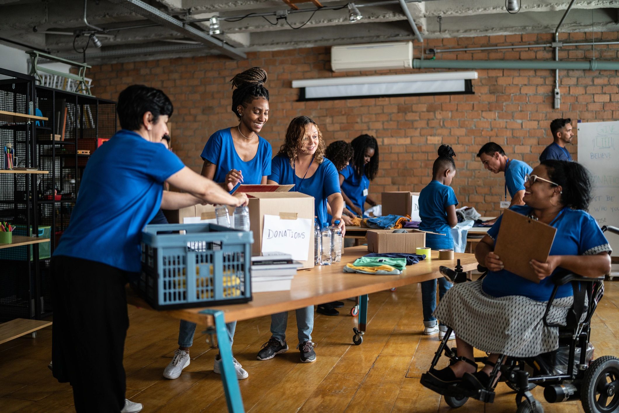 Community volunteers organizing support materials