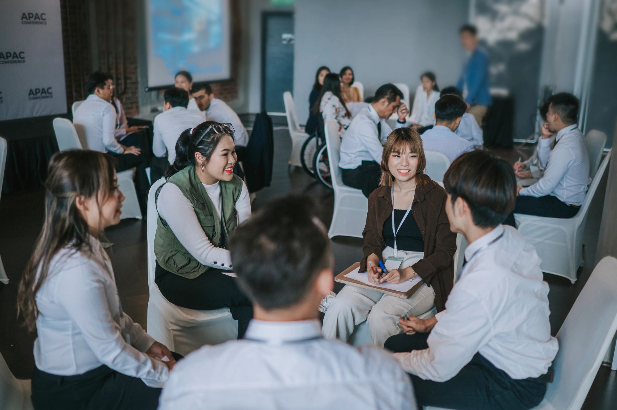 Collaborative workshop discussion among diverse professionals