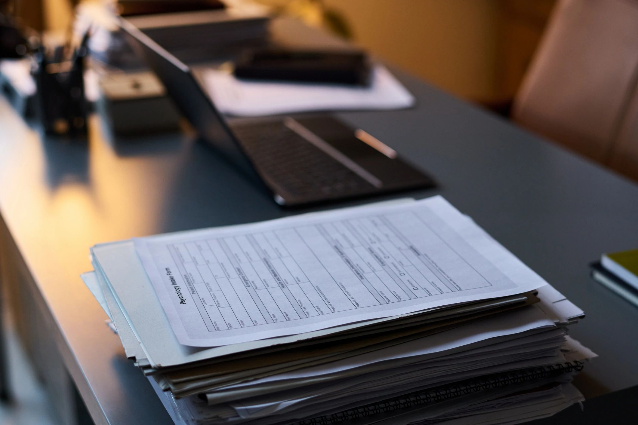 Documents and office supplies representing collected records and communications