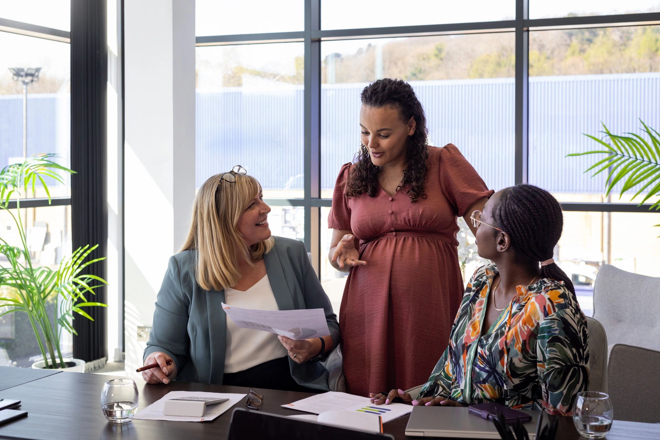 Professionals discussing strategy at a conference table