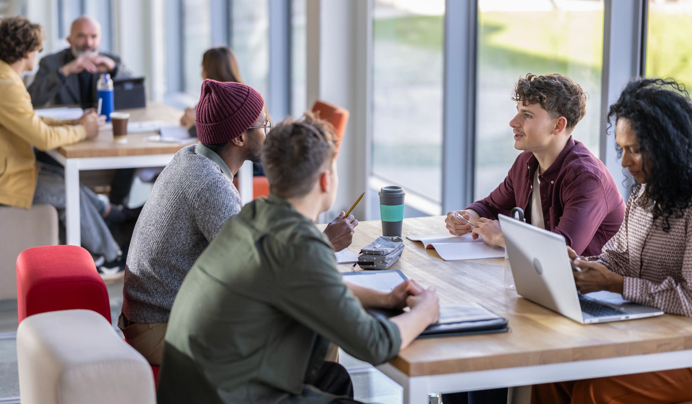 Colleagues brainstorming in a collaborative workspace