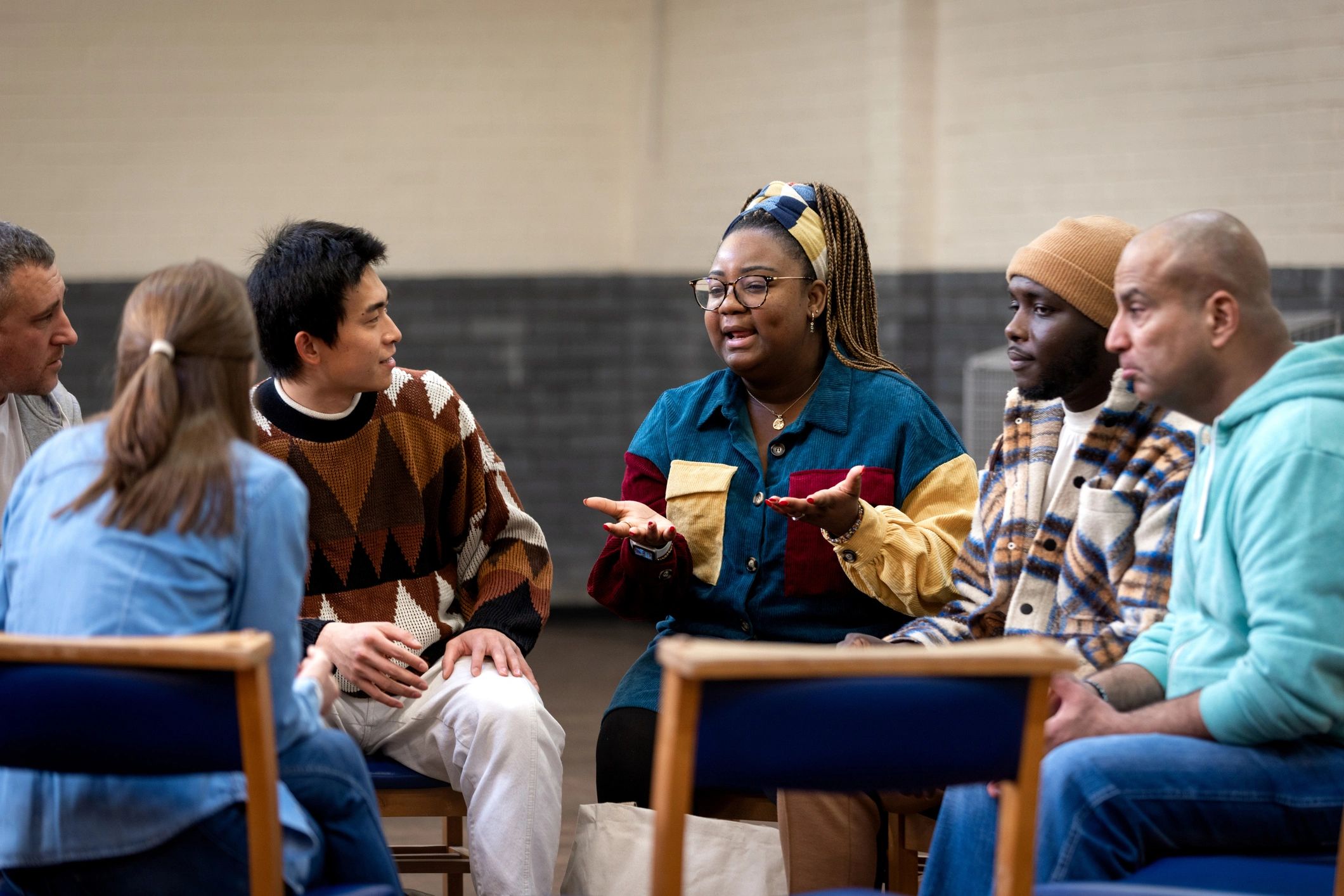 Community members in discussion together
