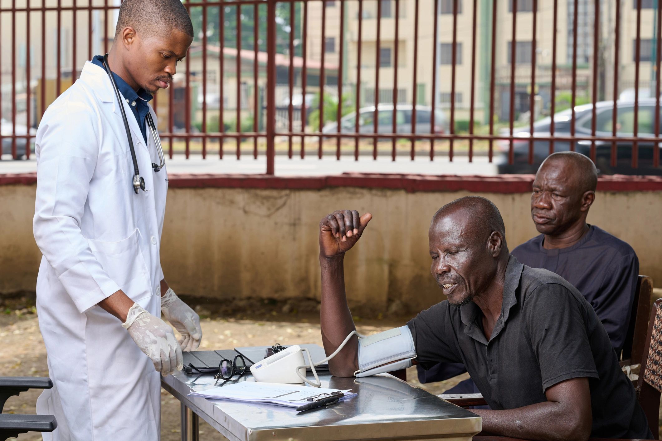 Community outreach scene representing public life and local institutions in West Africa